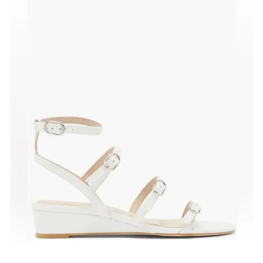 STUART WEITZMAN Grecian Buckle Wedge Sandal In White leather size 7.5 NWB